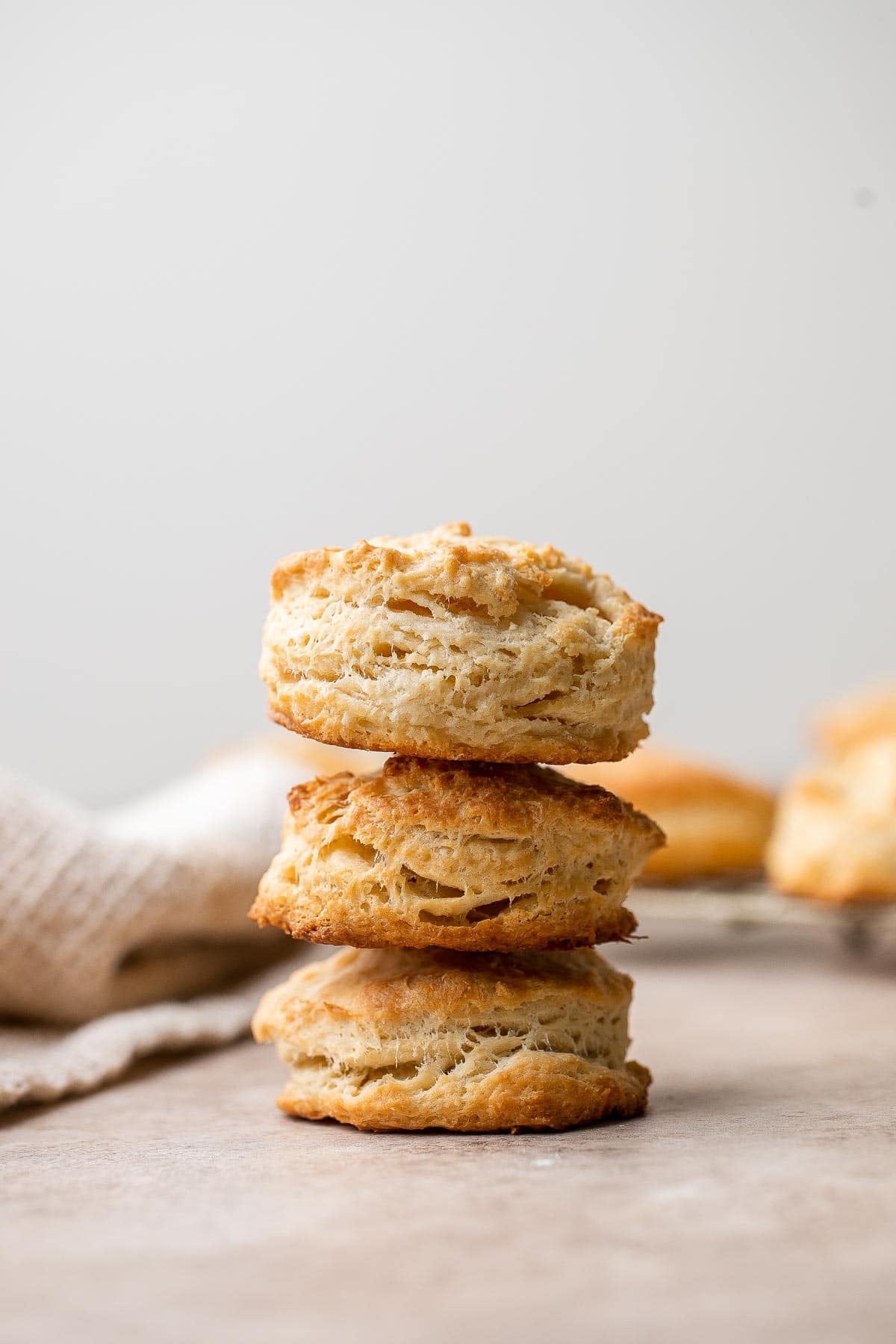 These classic Buttermilk Biscuits are perfectly tender with buttery, flaky layers. Quick and easy to make in just 30 minutes using a handful of ingredients. | aheadofthyme.com