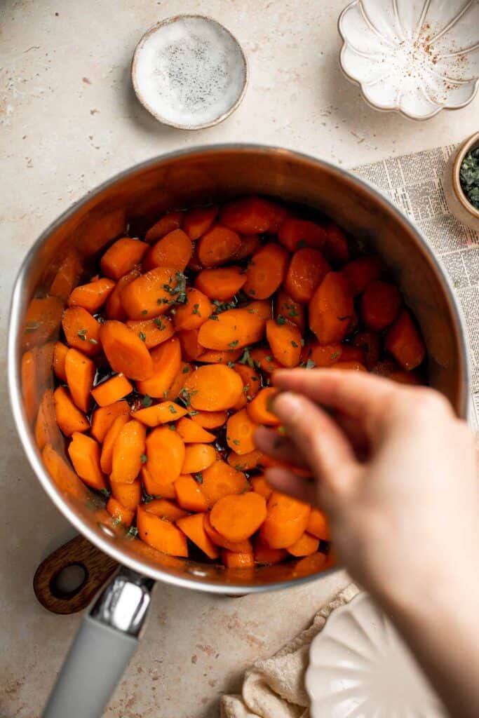 Candied Carrots are a delicious side dish that is sweetened with a simple brown sugar sauce before serving on your holiday table. It's so easy! | aheadofthyme.com