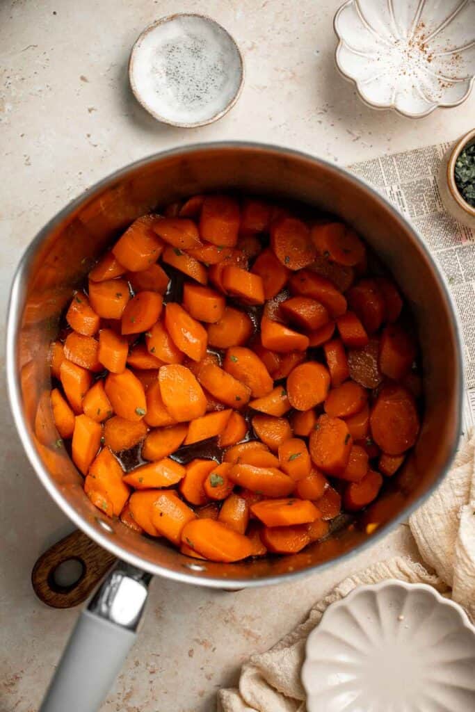 Candied Carrots are a delicious side dish that is sweetened with a simple brown sugar sauce before serving on your holiday table. It's so easy! | aheadofthyme.com