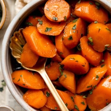 Candied Carrots are a delicious side dish that is sweetened with a simple brown sugar sauce before serving on your holiday table. It's so easy! | aheadofthyme.com