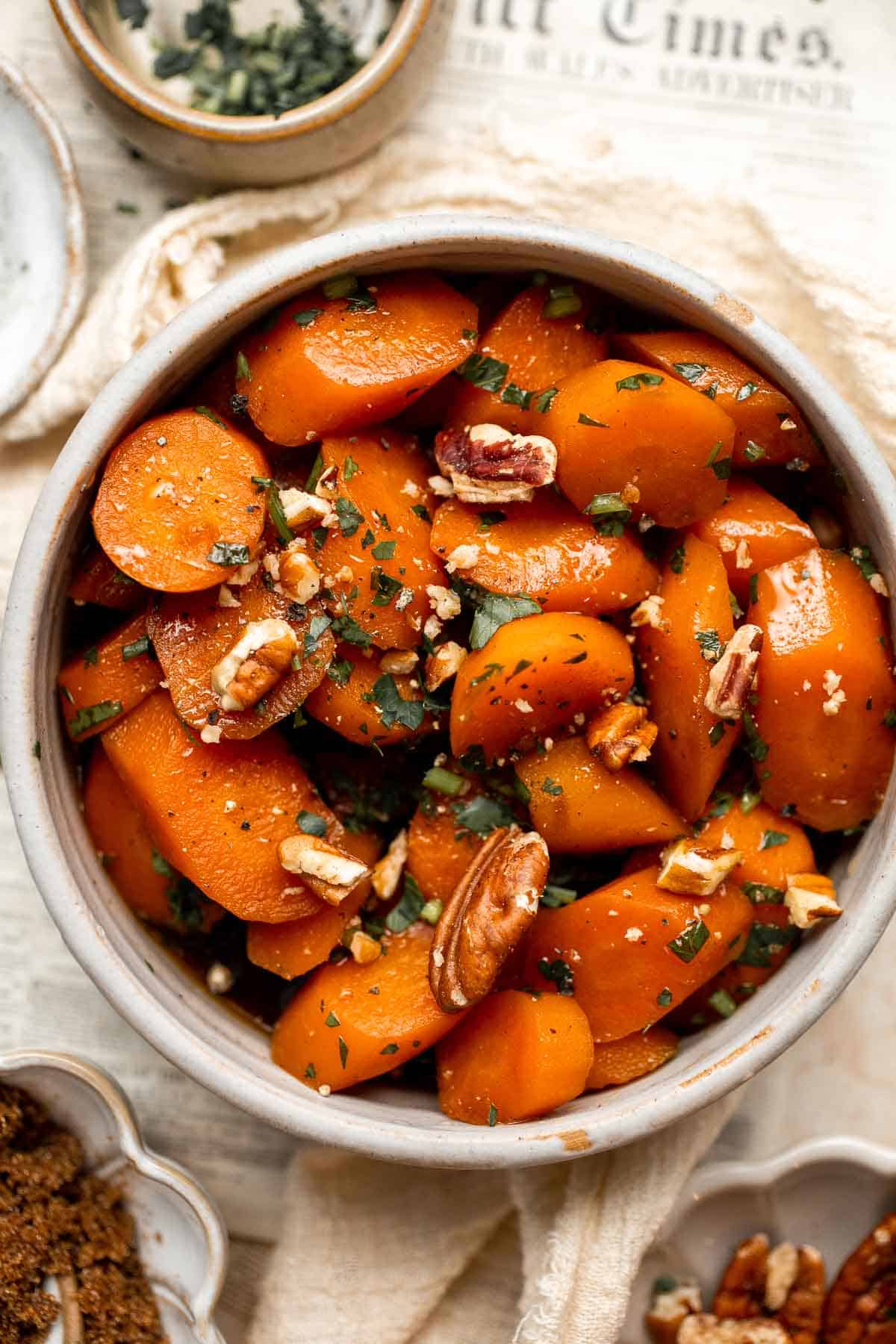 Candied Carrots are a delicious side dish that is sweetened with a simple brown sugar sauce before serving on your holiday table. It's so easy! | aheadofthyme.com