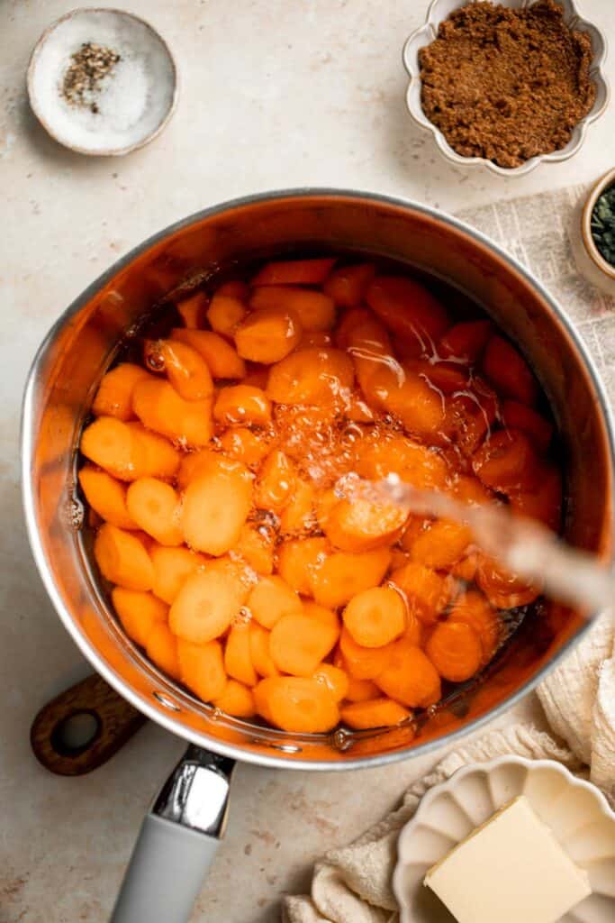 Candied Carrots are a delicious side dish that is sweetened with a simple brown sugar sauce before serving on your holiday table. It's so easy! | aheadofthyme.com