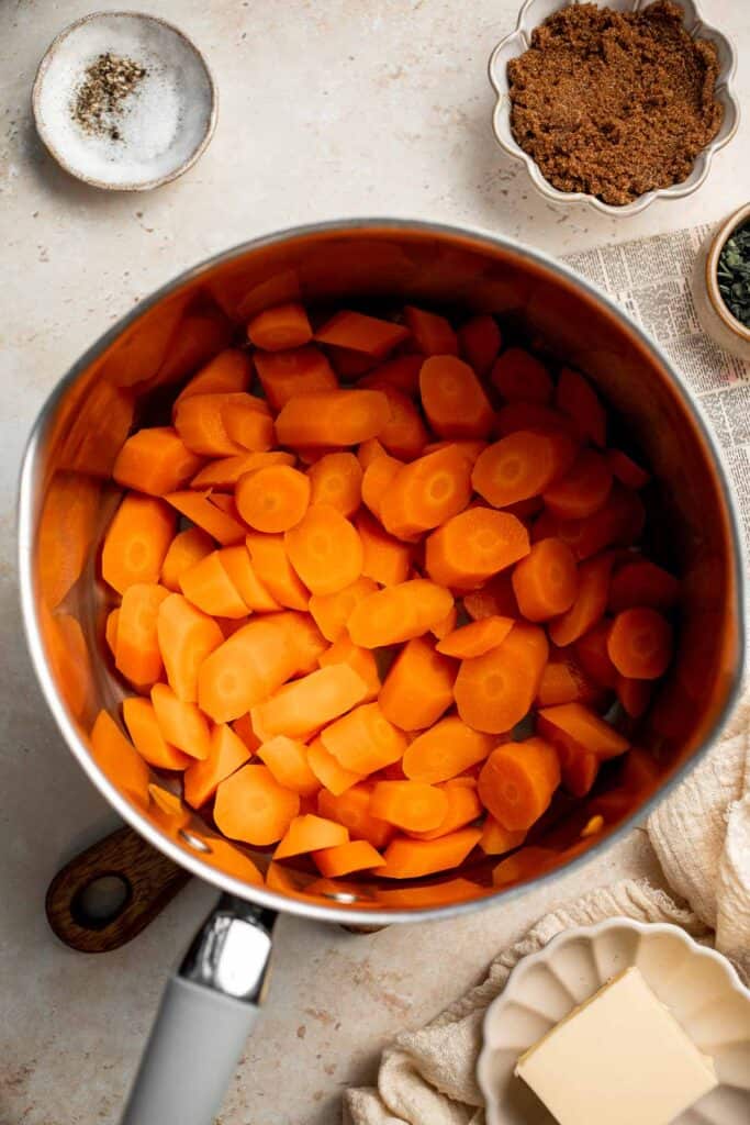 Candied Carrots are a delicious side dish that is sweetened with a simple brown sugar sauce before serving on your holiday table. It's so easy! | aheadofthyme.com