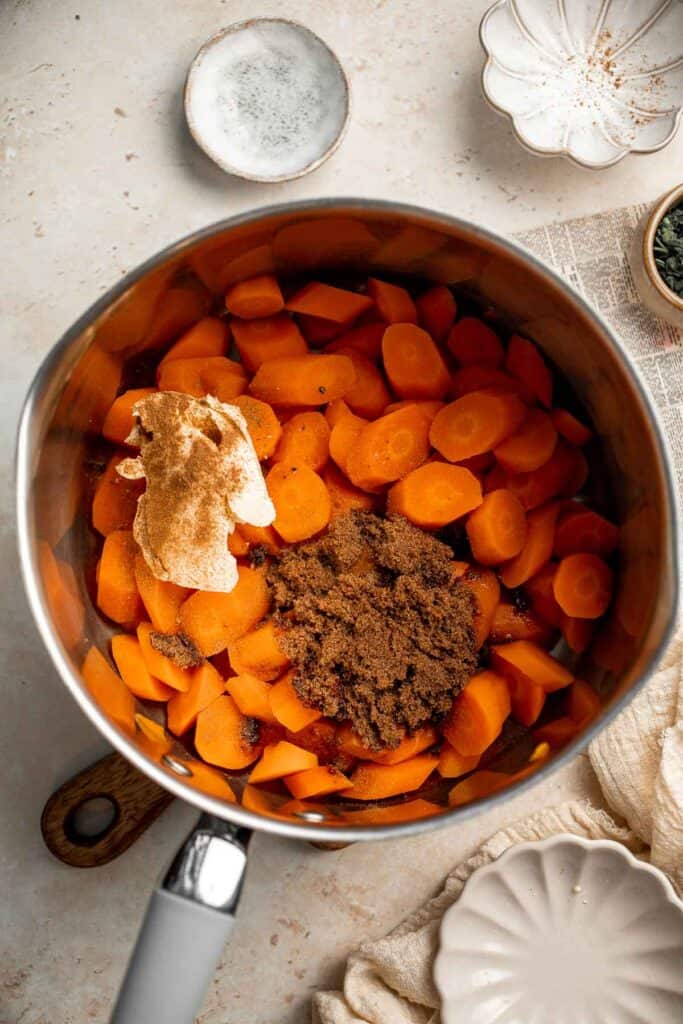 Candied Carrots are a delicious side dish that is sweetened with a simple brown sugar sauce before serving on your holiday table. It's so easy! | aheadofthyme.com