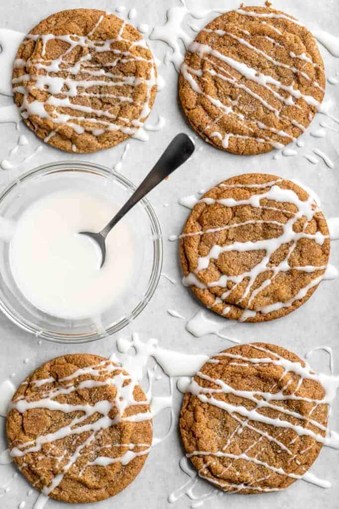 Soft and chewy Chai Cookies are loaded with warm chai spices and topped with drizzle of a sweet chai glaze. Quick and easy to make with no chill time! | aheadofthyme.com