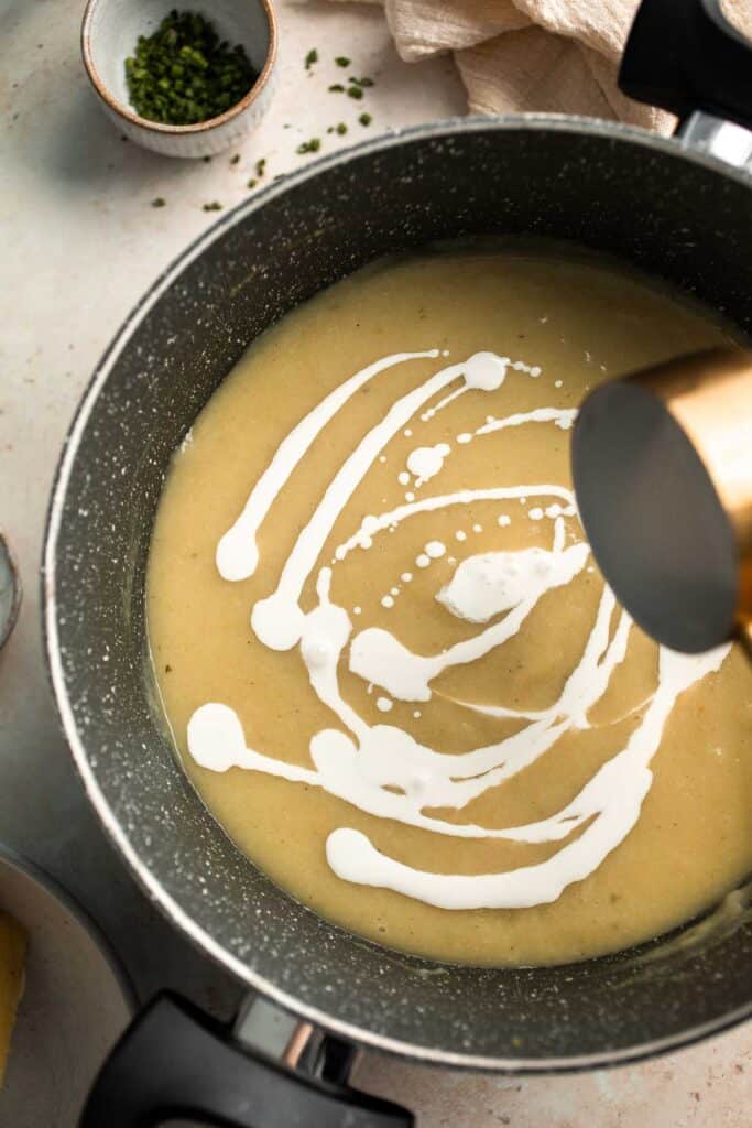 This Potato Leek Soup recipe is a classic for good reason! This creamy and velvety soup is quick and easy to make in 30 minutes using 8 ingredients. | aheadofthyme.com