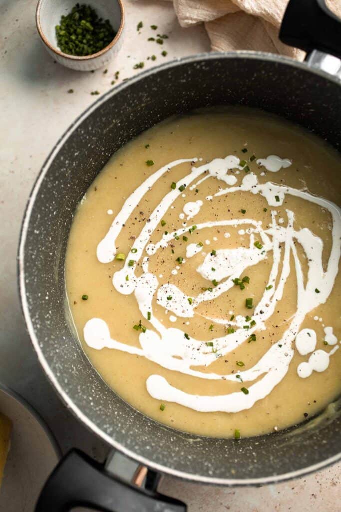 This Potato Leek Soup recipe is a classic for good reason! This creamy and velvety soup is quick and easy to make in 30 minutes using 8 ingredients. | aheadofthyme.com