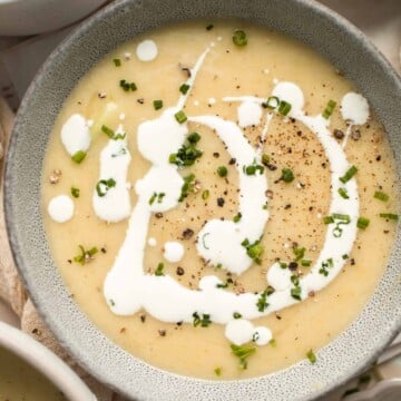 This Potato Leek Soup recipe is a classic for good reason! This creamy and velvety soup is quick and easy to make in 30 minutes using 8 ingredients. | aheadofthyme.com