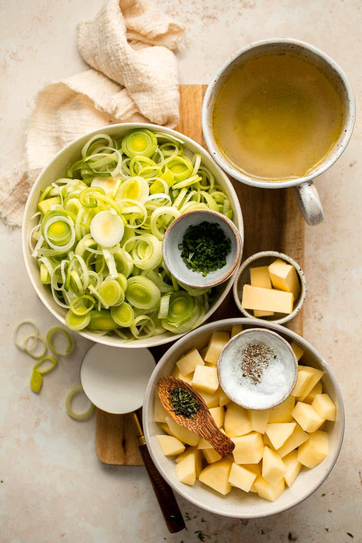 This Potato Leek Soup recipe is a classic for good reason! This creamy and velvety soup is quick and easy to make in 30 minutes using 8 ingredients. | aheadofthyme.com