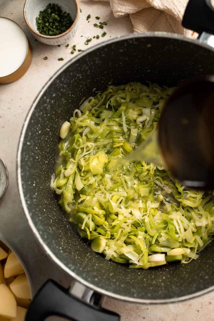 This Potato Leek Soup recipe is a classic for good reason! This creamy and velvety soup is quick and easy to make in 30 minutes using 8 ingredients. | aheadofthyme.com