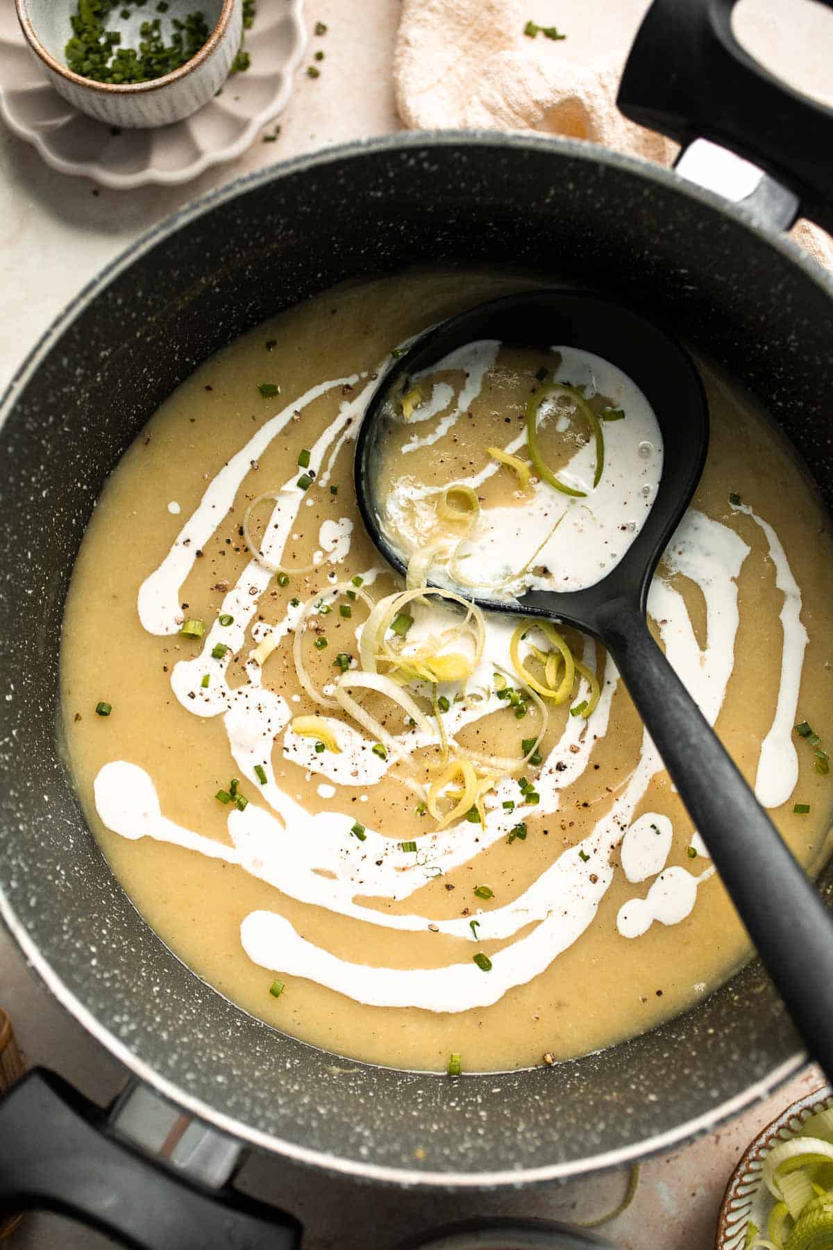 This Potato Leek Soup recipe is a classic for good reason! This creamy and velvety soup is quick and easy to make in 30 minutes using 8 ingredients. | aheadofthyme.com