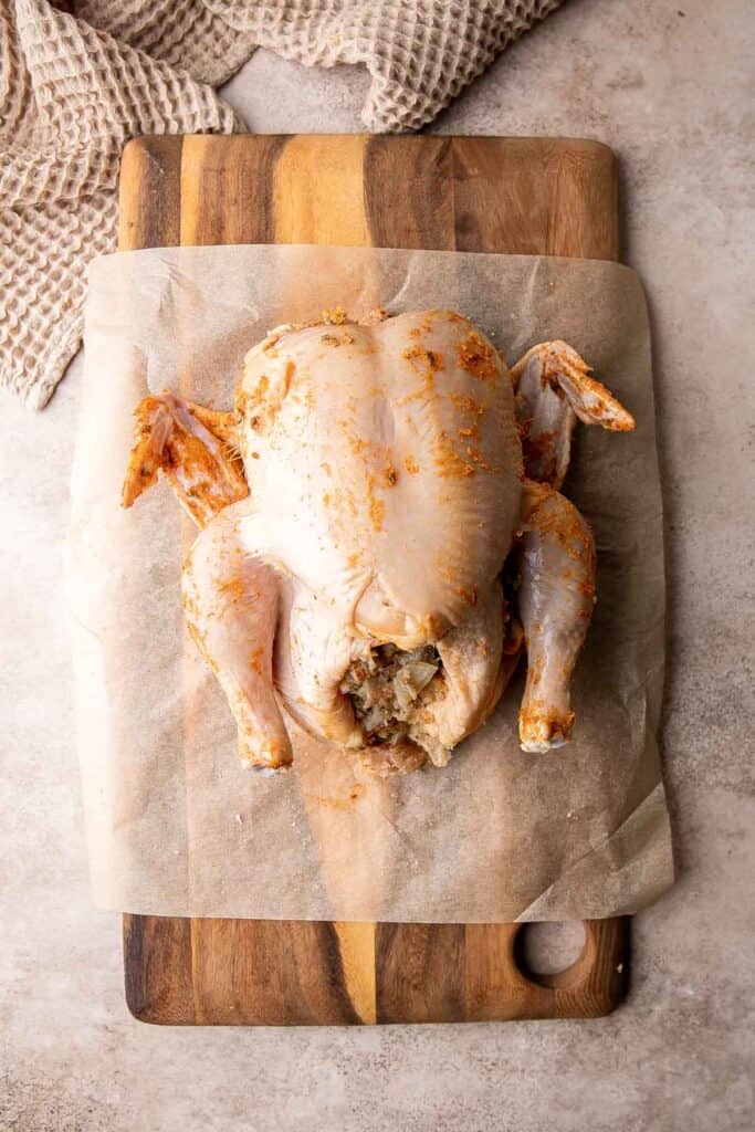Roast Stuffed Chicken is easy to make and has everything you need for a meal in one pan. Serve it for a special occasion or weekly for Sunday roast dinner. | aheadofthyme.com