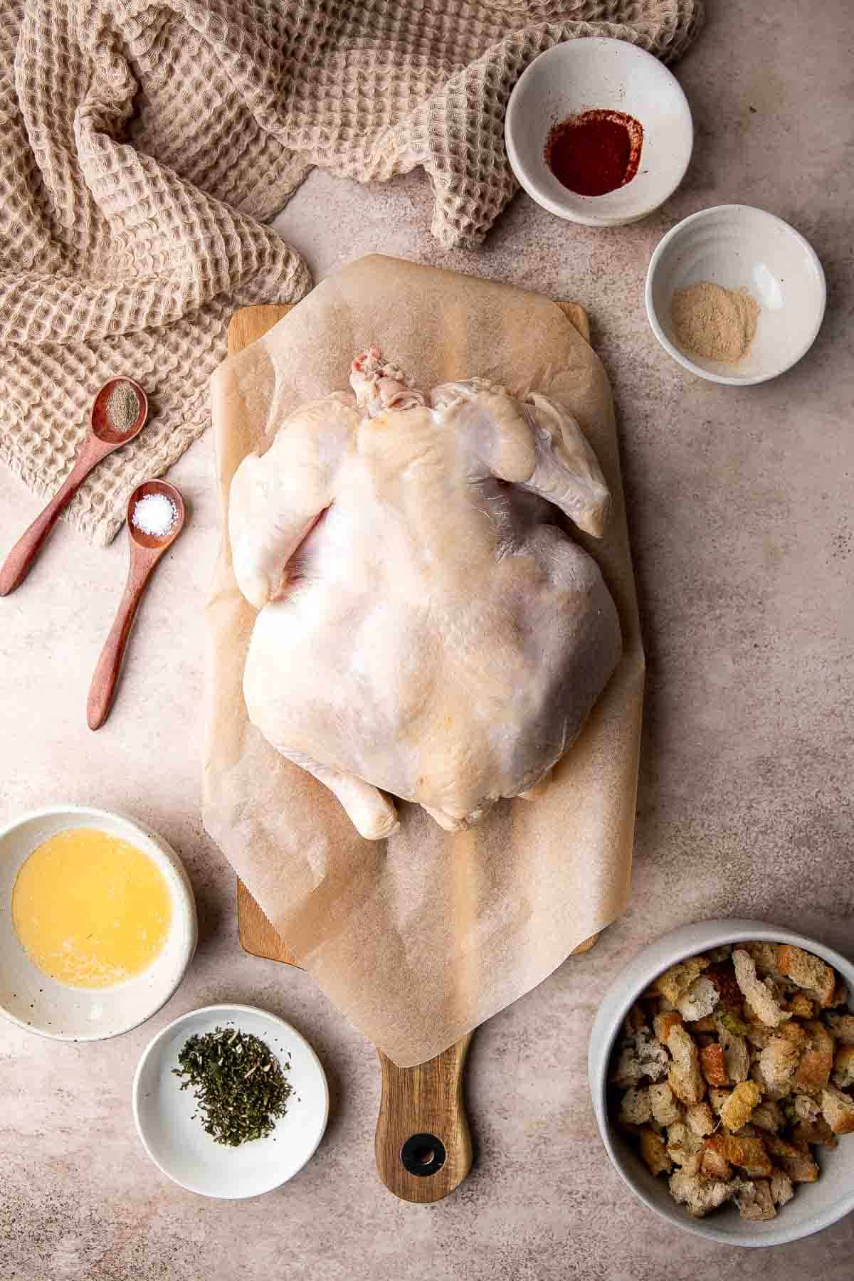 Roast Stuffed Chicken is easy to make and has everything you need for a meal in one pan. Serve it for a special occasion or weekly for Sunday roast dinner. | aheadofthyme.com