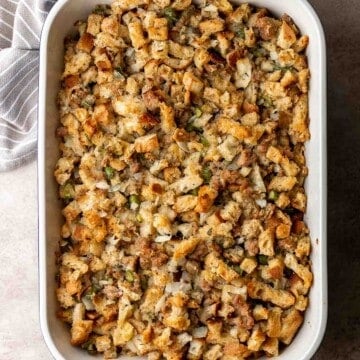 Sausage Stuffing is a classic holiday side dish that's easy to make with a handful of ingredients. Flavorful and moist, it's perfect for Thanksgiving. | aheadofthyme.com