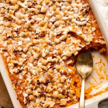 Sweet Potato Casserole with Marshmallows is a classic Thanksgiving side dish that is sweet and creamy with warm spices and molten, gooey marshmallows. | aheadofthyme.com