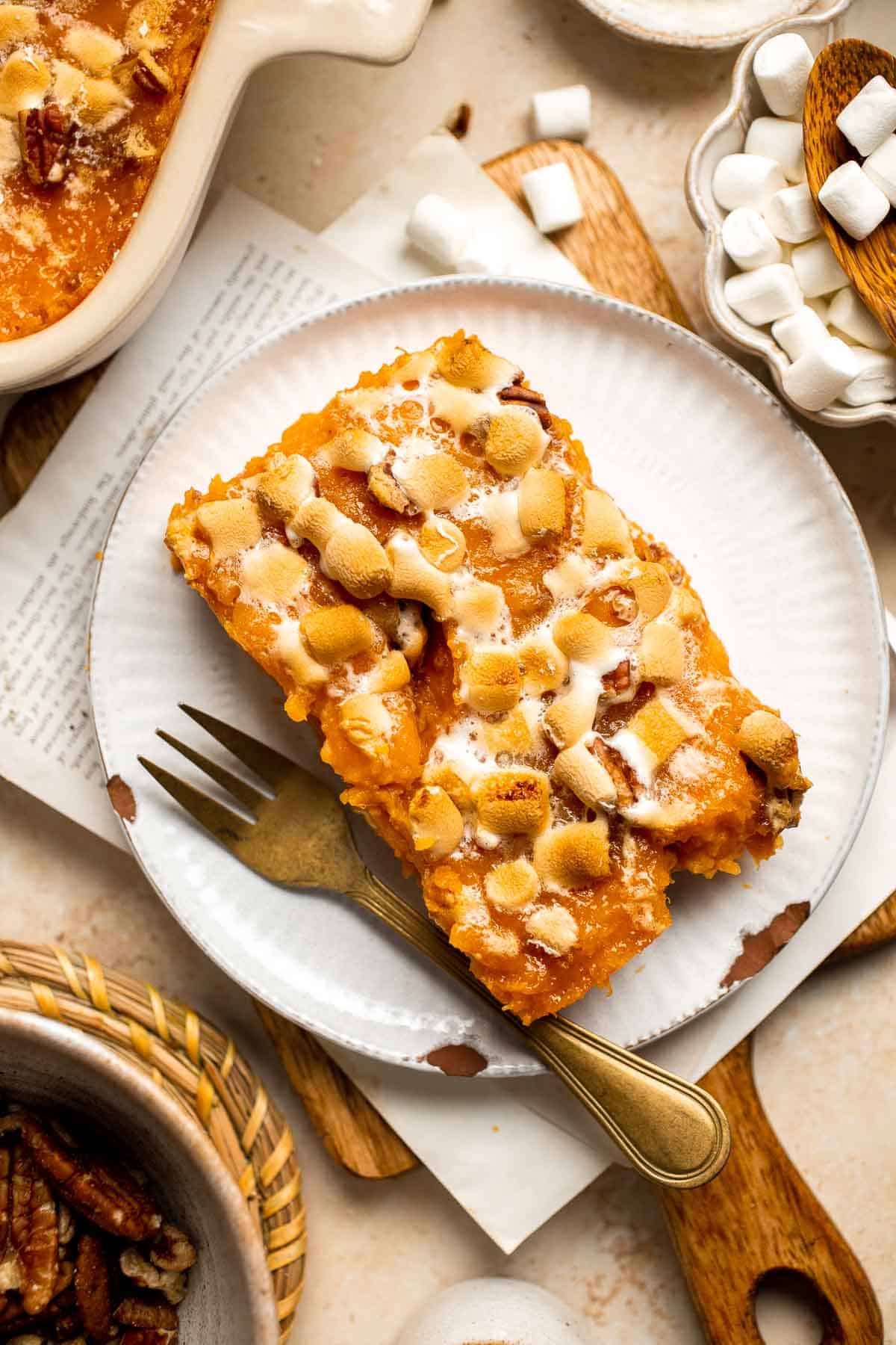 Sweet Potato Casserole with Marshmallows is a classic Thanksgiving side dish that is sweet and creamy with warm spices and molten, gooey marshmallows. | aheadofthyme.com