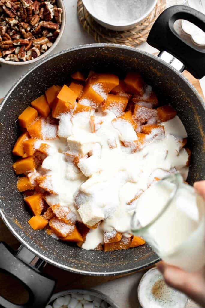 Sweet Potato Casserole with Marshmallows is a classic Thanksgiving side dish that is sweet and creamy with warm spices and molten, gooey marshmallows. | aheadofthyme.com