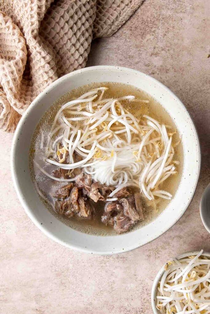 Vietnamese Pho is a one-of-a-kind soup known for its aromatic beef broth served over tender rice noodles, beef sirloin, fresh herbs, and other garnishes. | aheadofthyme.com