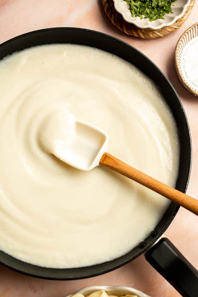 Creamy Cauliflower Alfredo is the perfect way to enjoy your favorite comfort food dinner while sneaking in extra veggies. It tastes like the real thing! | aheadofthyme.com