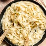 Creamy Cauliflower Alfredo is the perfect way to enjoy your favorite comfort food dinner while sneaking in extra veggies. It tastes like the real thing! | aheadofthyme.com