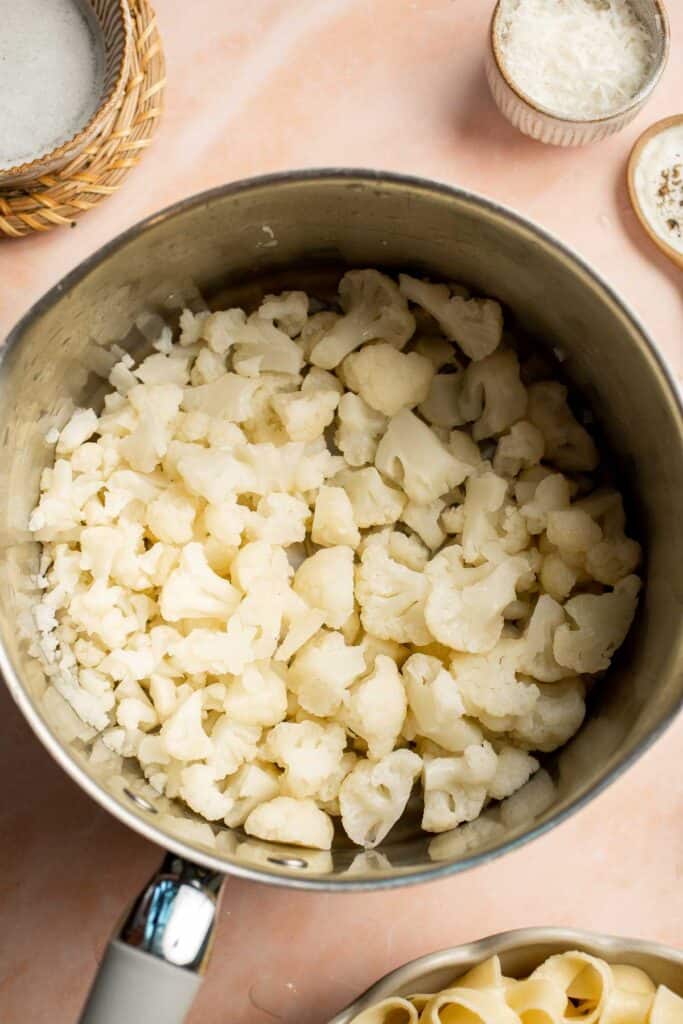 Creamy Cauliflower Alfredo is the perfect way to enjoy your favorite comfort food dinner while sneaking in extra veggies. It tastes like the real thing! | aheadofthyme.com