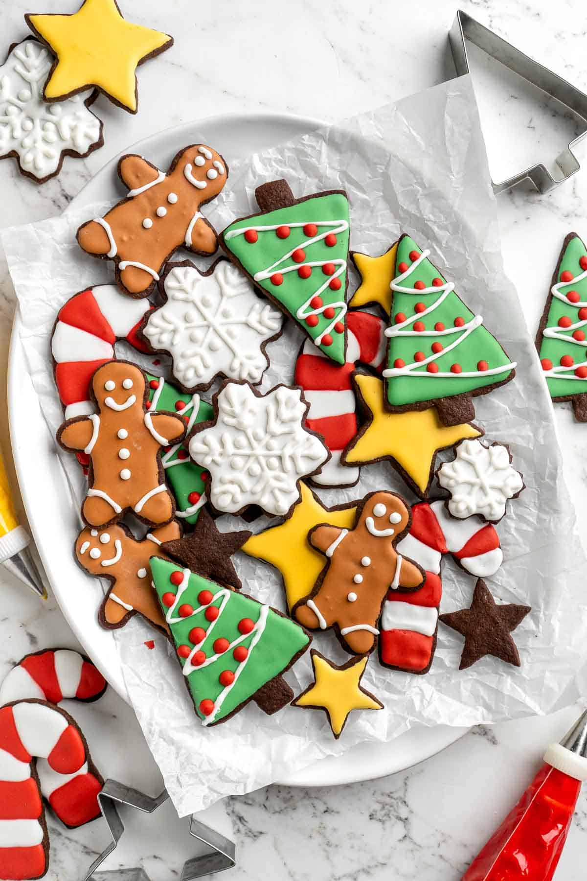 Chocolate Sugar Cookies are a fun twist on traditional sugar cookies. The warm brown color is the perfect background for creative piping and decorating. | aheadofthyme.com