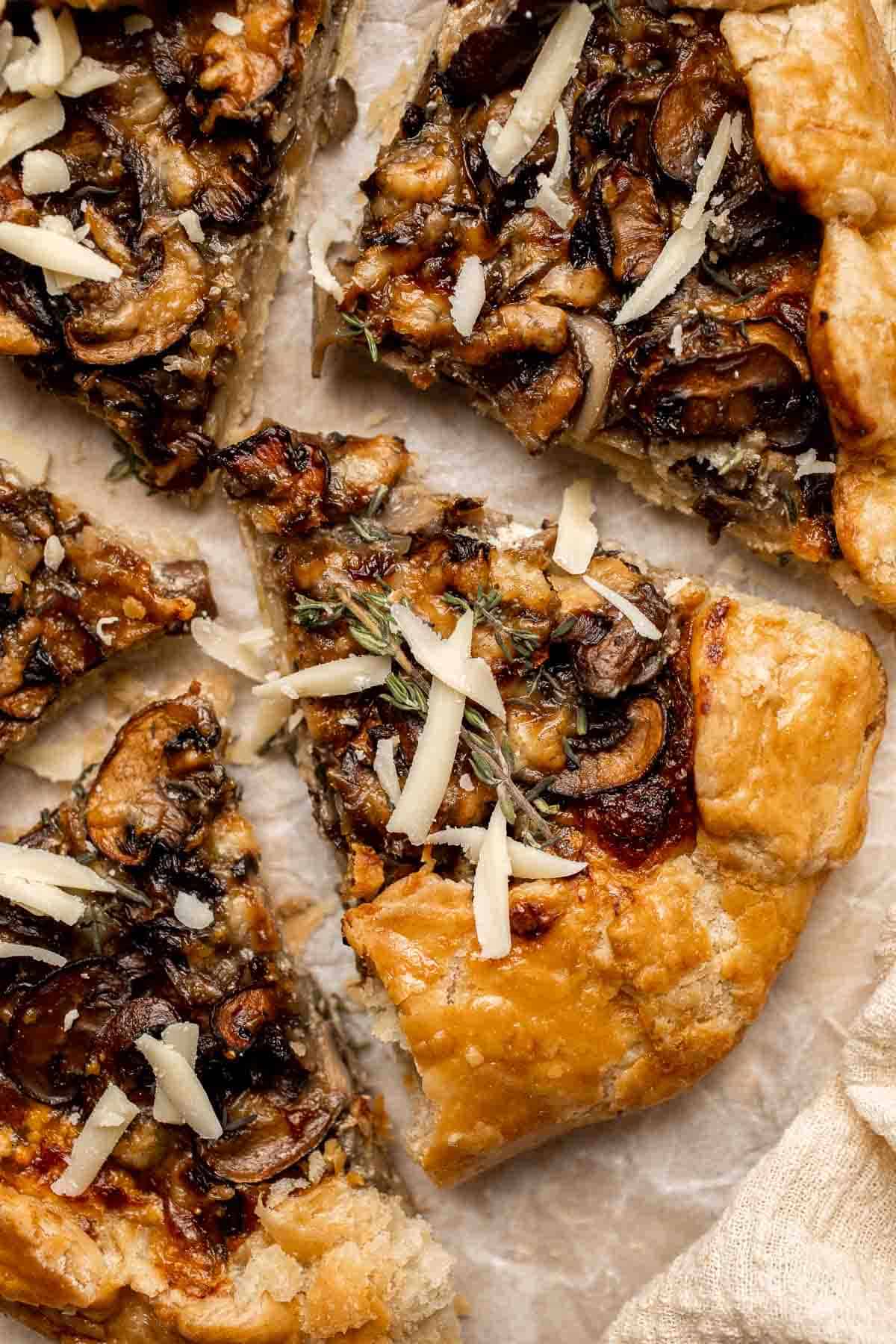 Made with homemade pie crust and an earthy, cheesy mushroom filling, this savory Mushroom Galette is an absolute delight. Serve for appetizer or side dish. | aheadofthyme.com