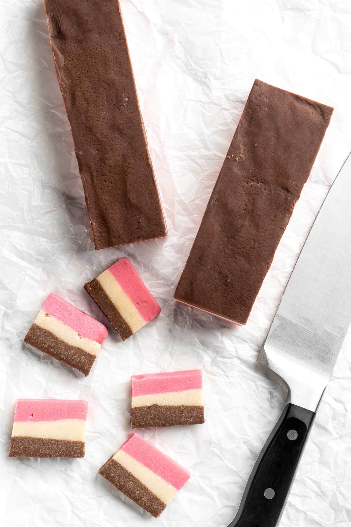 With their iconic pink, brown, and white stripes, these homemade Neapolitan Cookies are both beautiful and delicious. Made with 3 flavors in one dough! | aheadofthyme.com