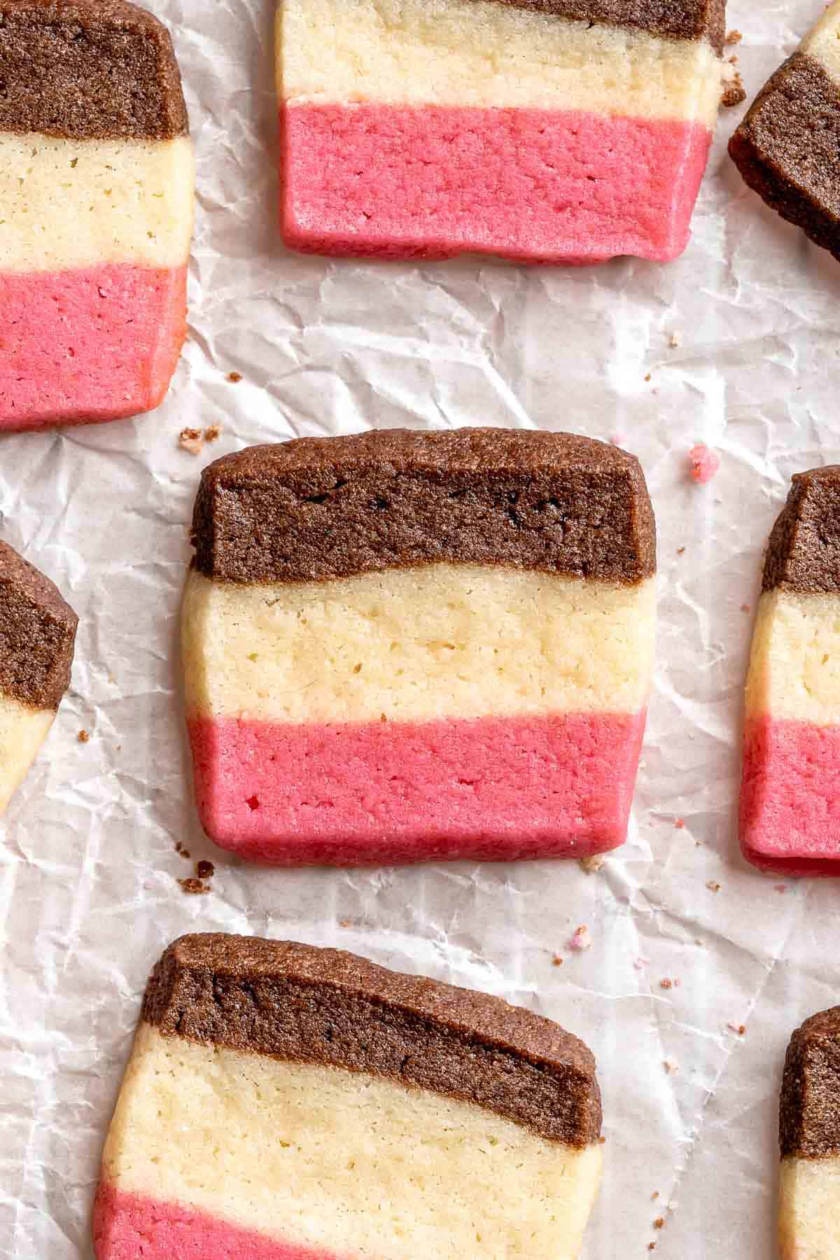 With their iconic pink, brown, and white stripes, these homemade Neapolitan Cookies are both beautiful and delicious. Made with 3 flavors in one dough! | aheadofthyme.com