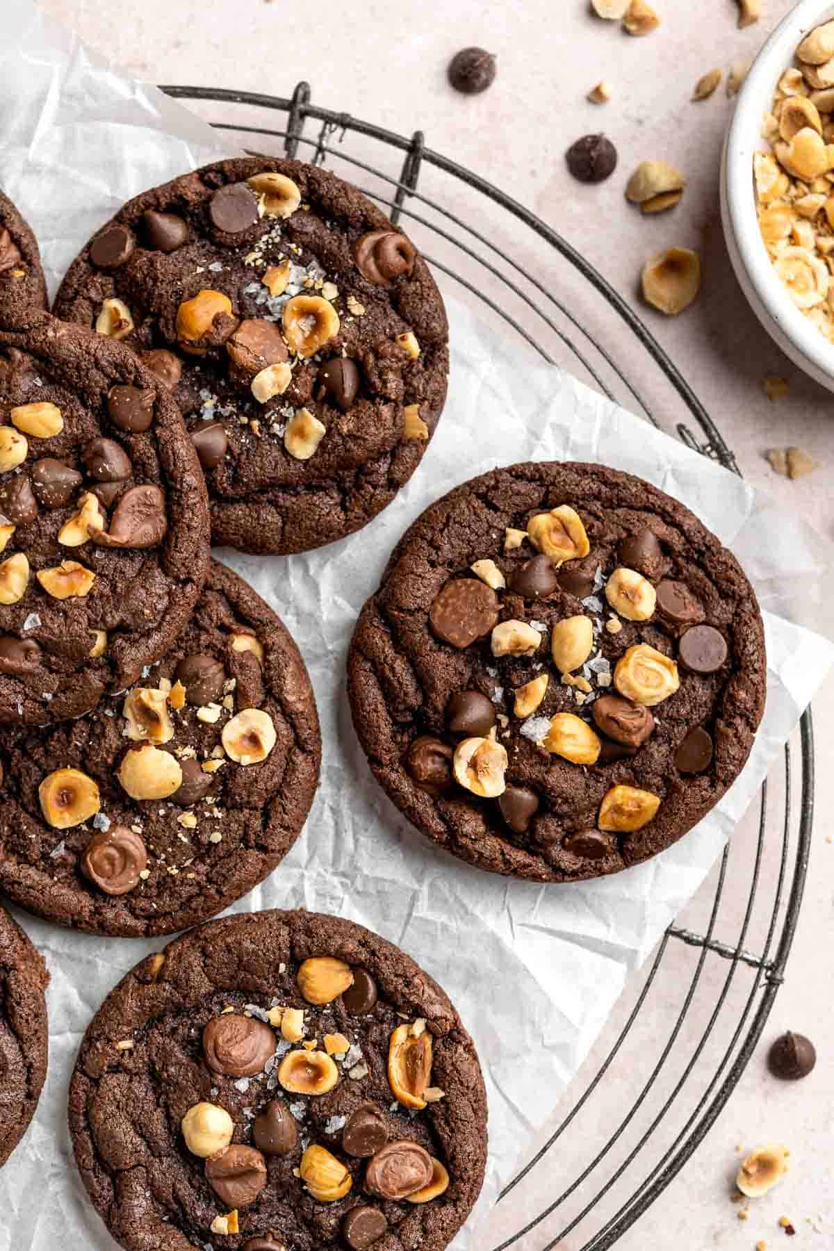 These homemade Nutella Cookies are tender, delicious, and chewy, loaded with chocolate chips, chopped hazelnut pieces, and homemade Nutella chips. | aheadofthyme.com