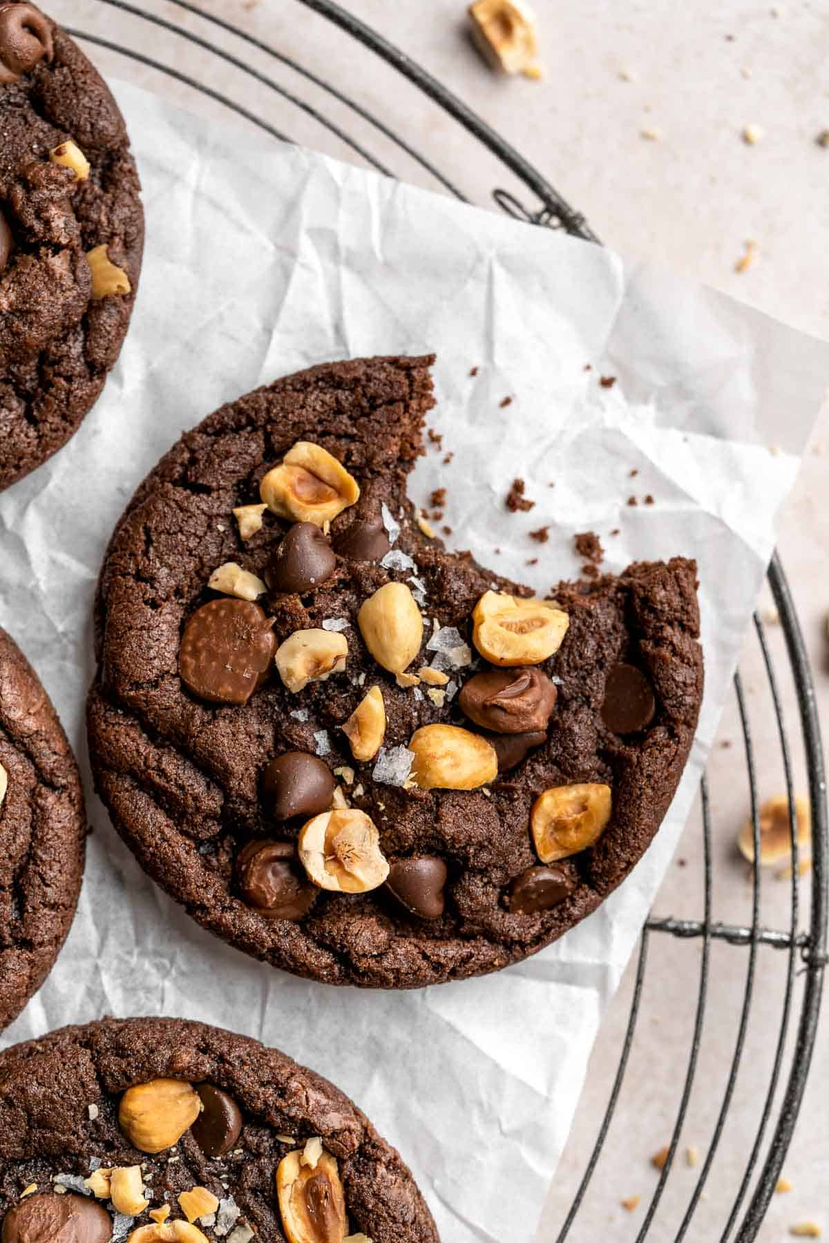 These homemade Nutella Cookies are tender, delicious, and chewy, loaded with chocolate chips, chopped hazelnut pieces, and homemade Nutella chips. | aheadofthyme.com