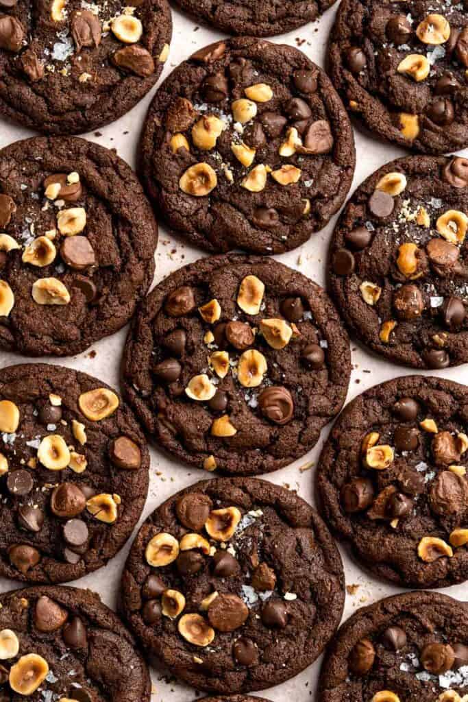 These homemade Nutella Cookies are tender, delicious, and chewy, loaded with chocolate chips, chopped hazelnut pieces, and homemade Nutella chips. | aheadofthyme.com