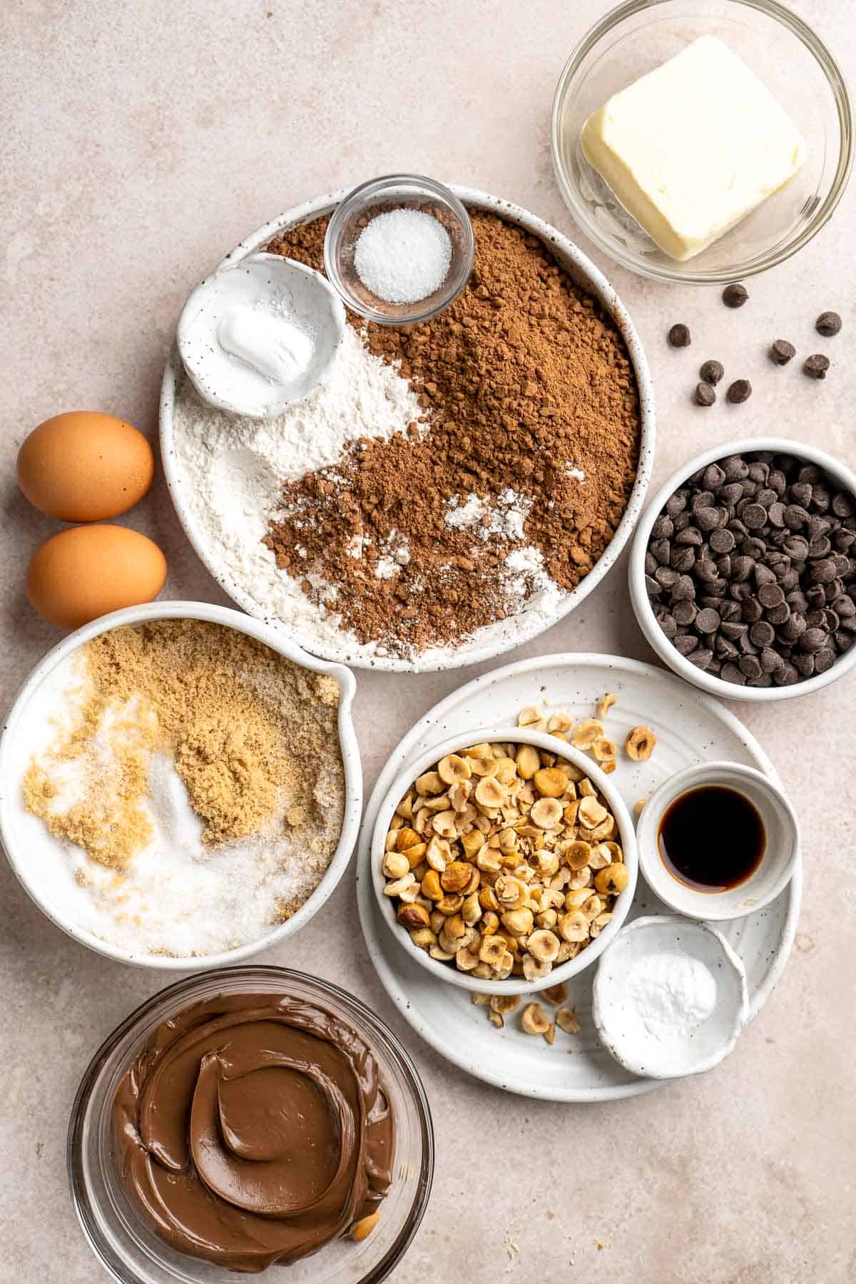 These homemade Nutella Cookies are tender, delicious, and chewy, loaded with chocolate chips, chopped hazelnut pieces, and homemade Nutella chips. | aheadofthyme.com