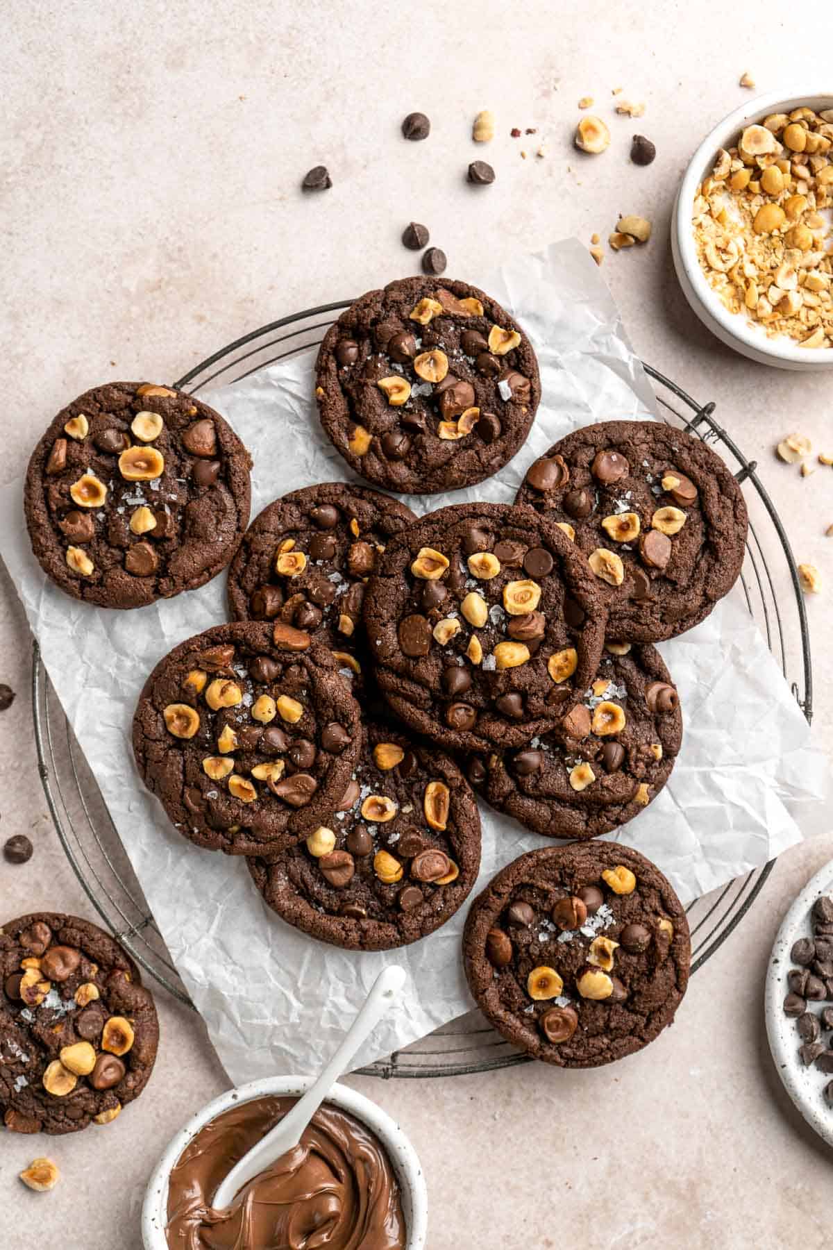 These homemade Nutella Cookies are tender, delicious, and chewy, loaded with chocolate chips, chopped hazelnut pieces, and homemade Nutella chips. | aheadofthyme.com