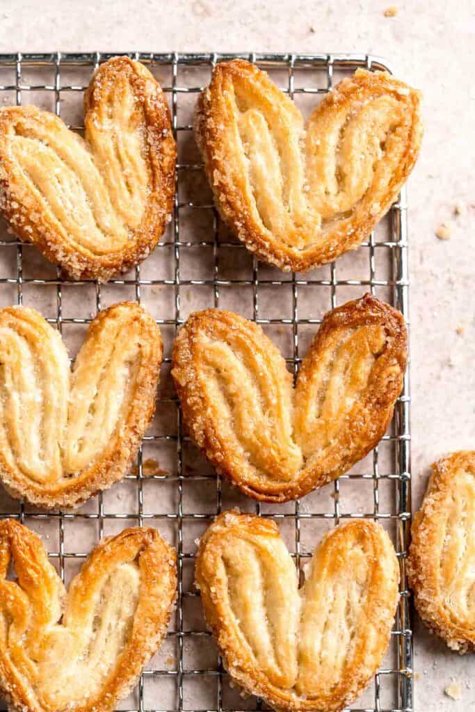 Palmiers are light, crunchy, swirled treats you can easily make in under 30 minutes using just 2 ingredients. They're buttery, crispy, flaky, and sweet. | aheadofthyme.com