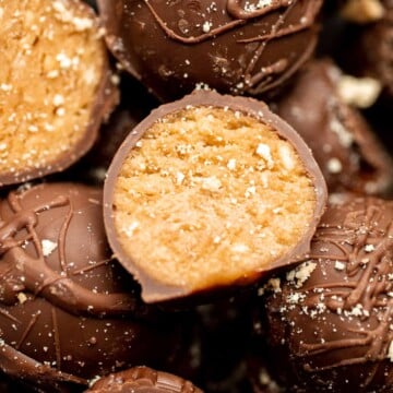 Soft, sweet, and creamy, these no bake Peanut Butter Balls are perfect as bite-sized treats for the holidays or any day you need a little pick-me-up. | aheadofthyme.com