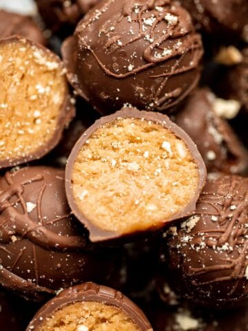 Soft, sweet, and creamy, these no bake Peanut Butter Balls are perfect as bite-sized treats for the holidays or any day you need a little pick-me-up. | aheadofthyme.com