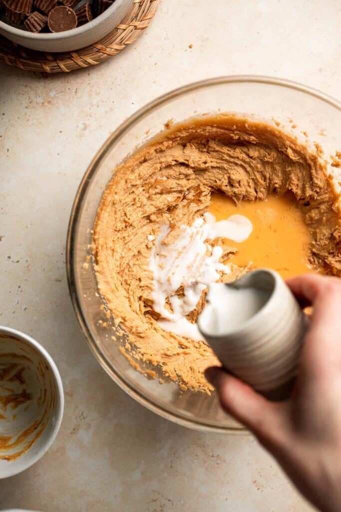 Easy Peanut Butter Cup Cookies are tall and thick, classic Christmas cookies made with peanut butter cookie dough and a mini Reese's cup pressed in. | aheadofthyme.com