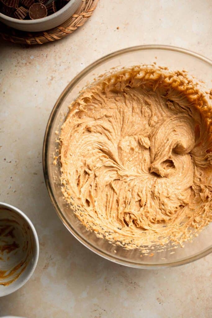 Easy Peanut Butter Cup Cookies are tall and thick, classic Christmas cookies made with peanut butter cookie dough and a mini Reese's cup pressed in. | aheadofthyme.com