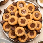 Easy Peanut Butter Cup Cookies are tall and thick, classic Christmas cookies made with peanut butter cookie dough and a mini Reese's cup pressed in. | aheadofthyme.com