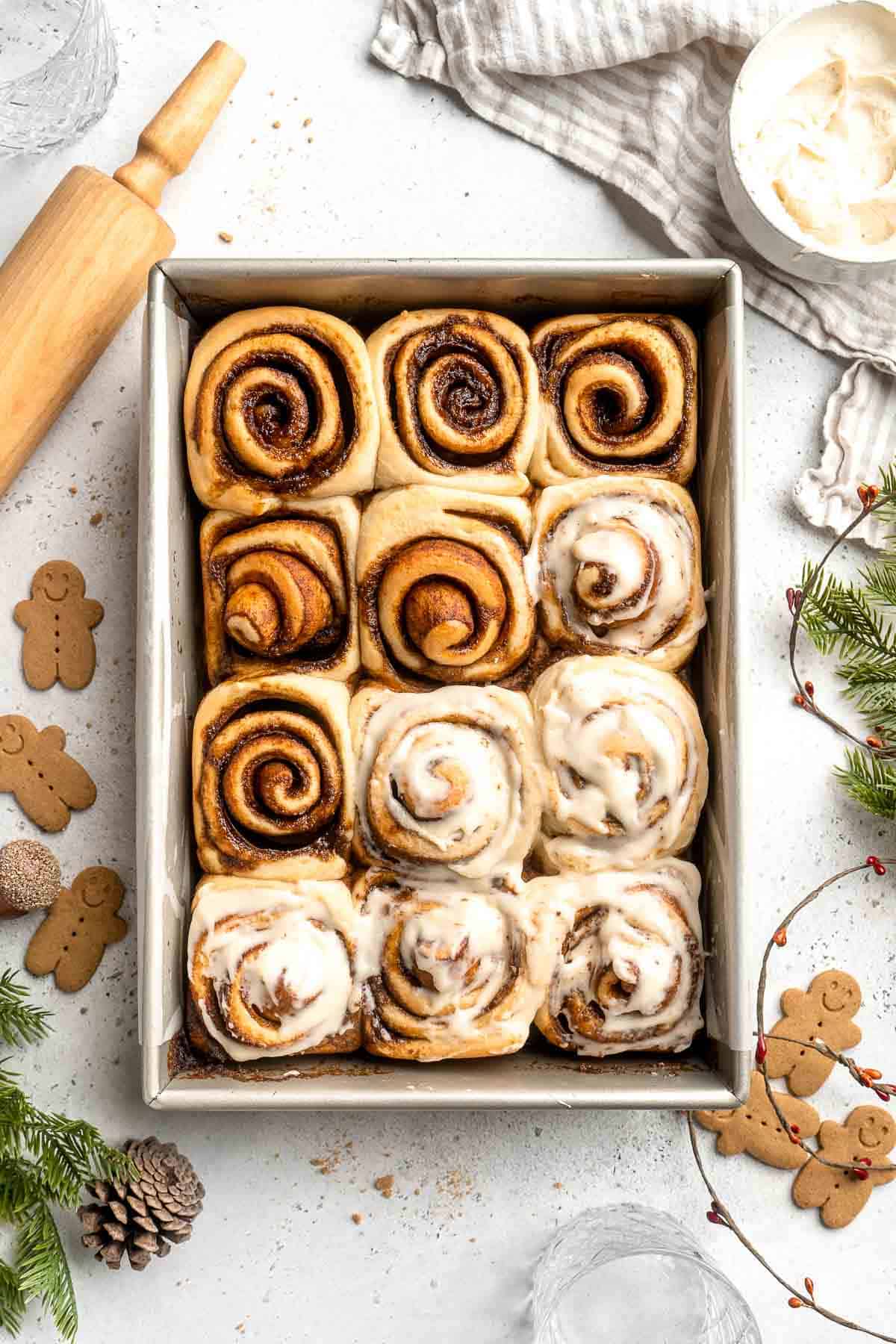 Gingerbread Cinnamon Rolls are made with a rich gingerbread filling and topped with cream cheese frosting. A must-have during the holiday season! | aheadofthyme.com