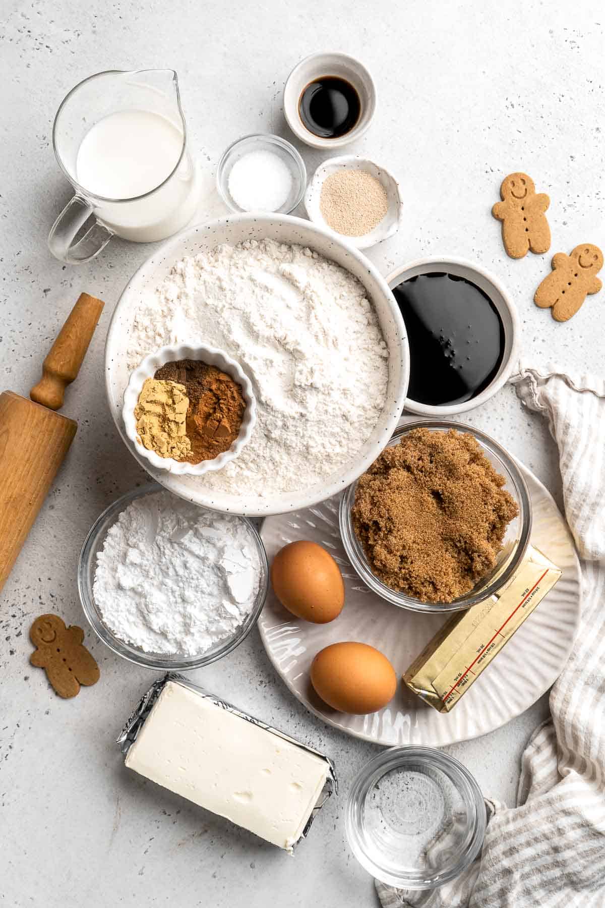 Gingerbread Cinnamon Rolls are made with a rich gingerbread filling and topped with cream cheese frosting. A must-have during the holiday season! | aheadofthyme.com