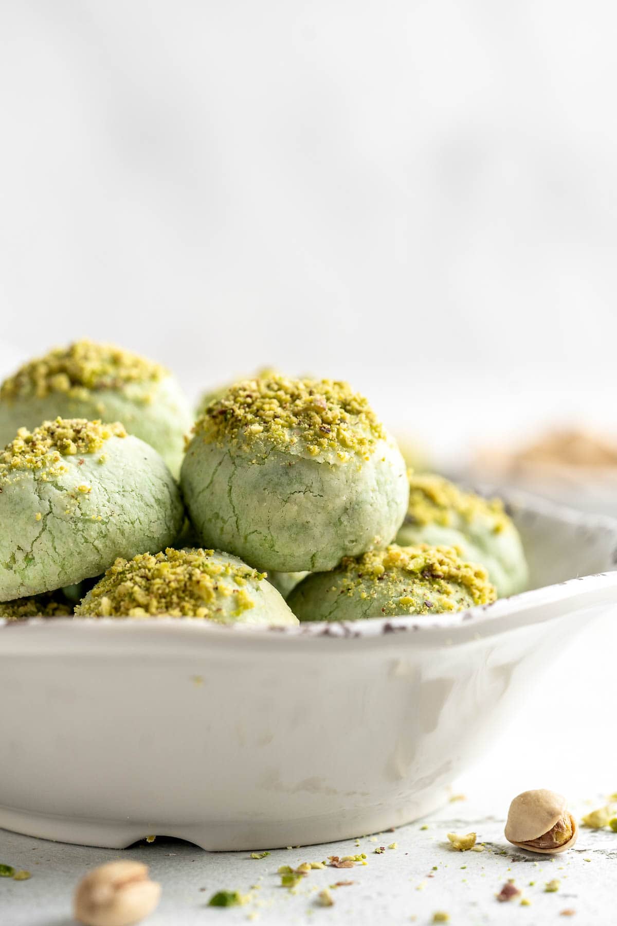 Pistachio Cookies are the perfect little bites, made with real ground pistachios suspended in a buttery, crumbly cookie dough, which melts in your mouth. | aheadofthyme.com