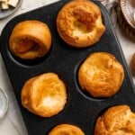 Popovers (or Yorkshire pudding) are light, puffed rolls that "pop over" the top of the pan and are a must-have to serve with your Sunday roast. | aheadofthyme.com