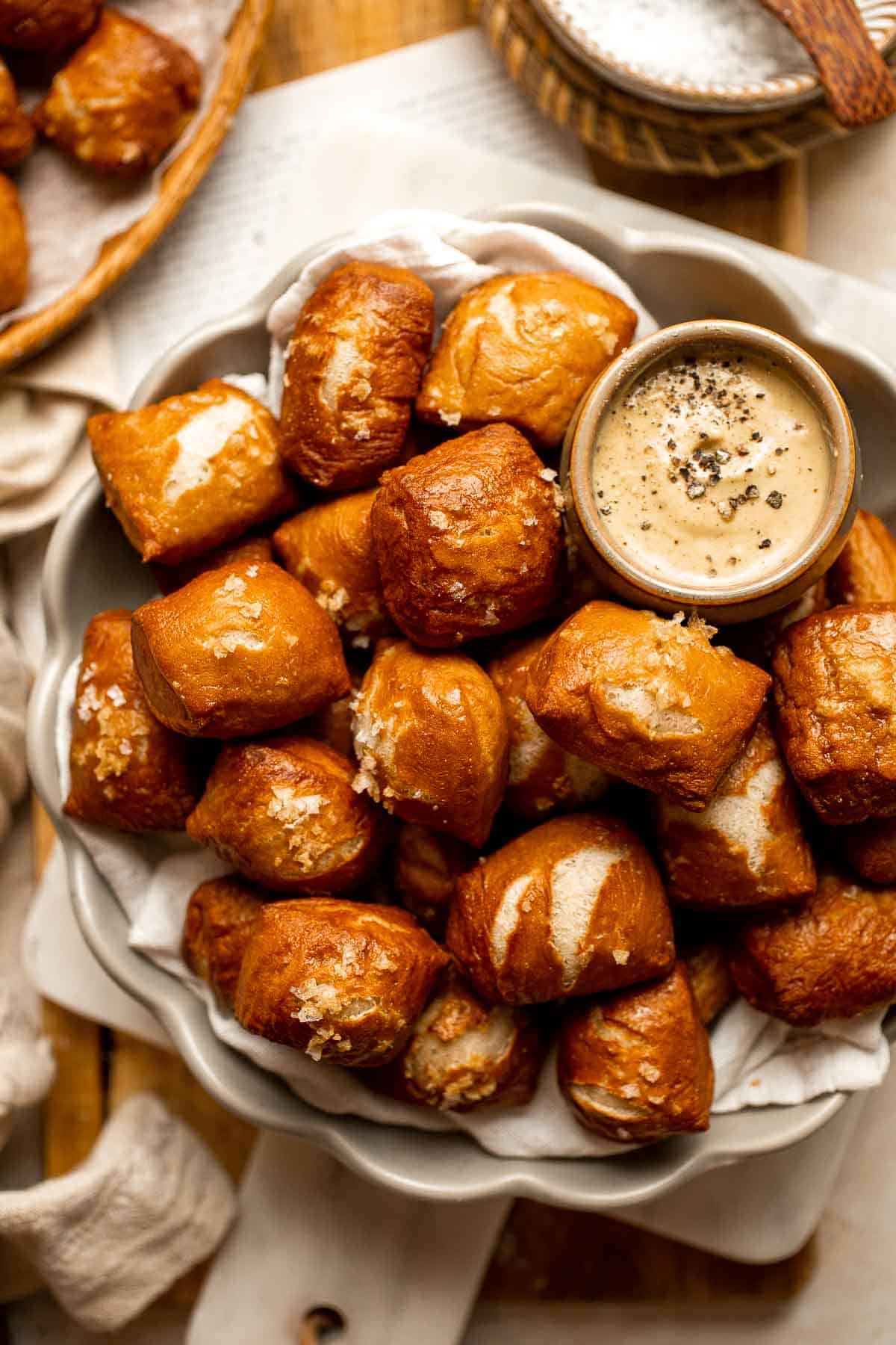 These tender, chewy homemade Pretzel Bites taste professionally made but are a beginner-friendly recipe you can easily make in the comfort of your own home. | aheadofthyme.com