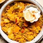 This Vegetable Biryani is a warming and comforting recipe, that is full of flavor and many different textures, making it the ultimate vegetarian side dish. | aheadofthyme.com
