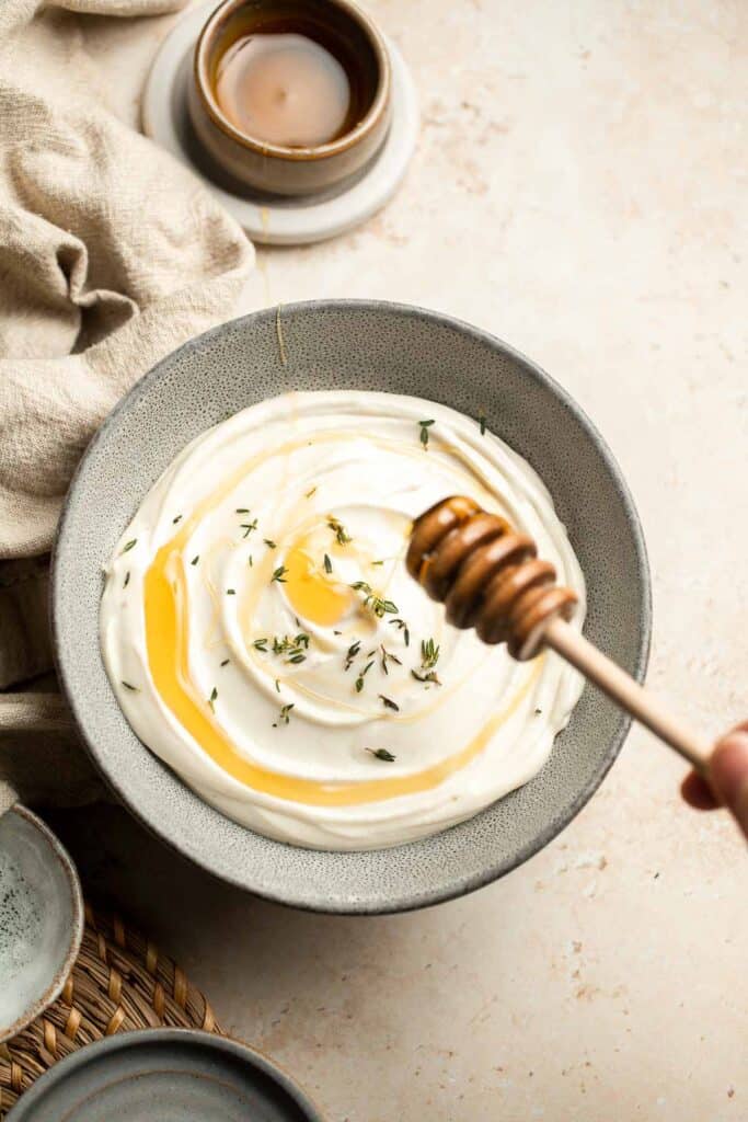 Whipped Goat Cheese is a delicious and creamy appetizer dip or spread you can easily make at home in 5 minutes. It's light, fluffy, and tangy. | aheadofthyme.com