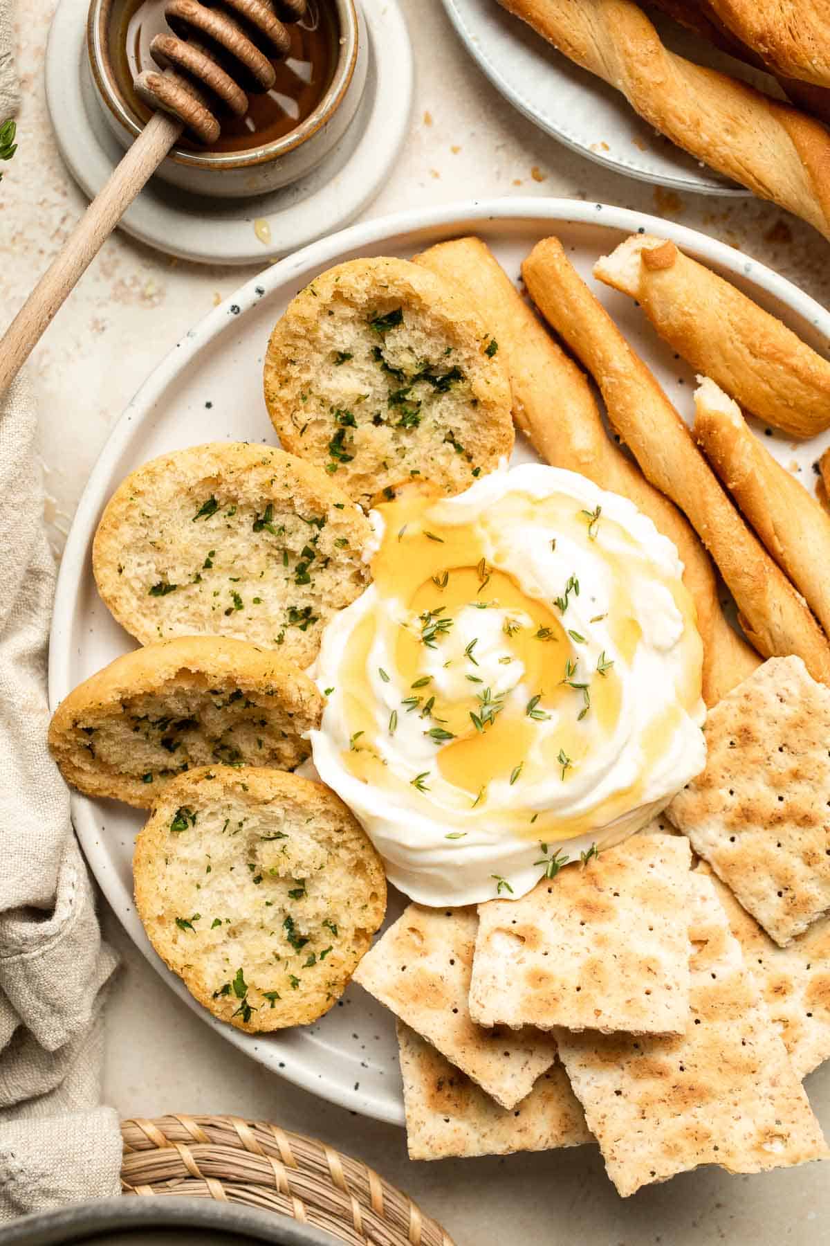 Whipped Goat Cheese is a delicious and creamy appetizer dip or spread you can easily make at home in 5 minutes. It's light, fluffy, and tangy. | aheadofthyme.com