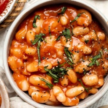 Homemade Baked Beans are the perfect side dish with their sweet and savory flavor, tender beans, and glossy sauce. So much better than canned baked beans! | aheadofthyme.com