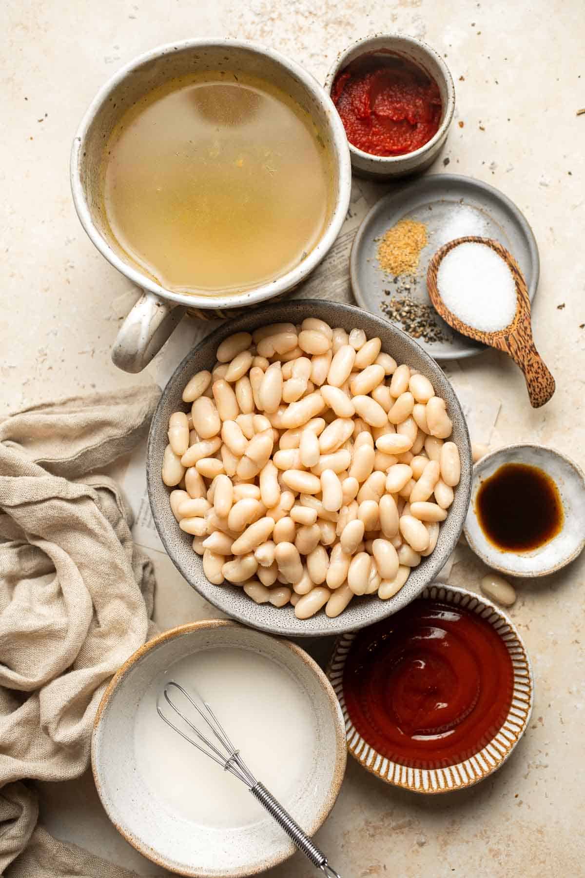 Homemade Baked Beans are the perfect side dish with their sweet and savory flavor, tender beans, and glossy sauce. So much better than canned baked beans! | aheadofthyme.com